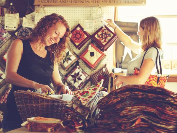 woman shopping for quilt patterns